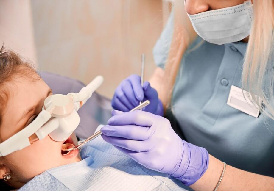 dentist working on toddler patient